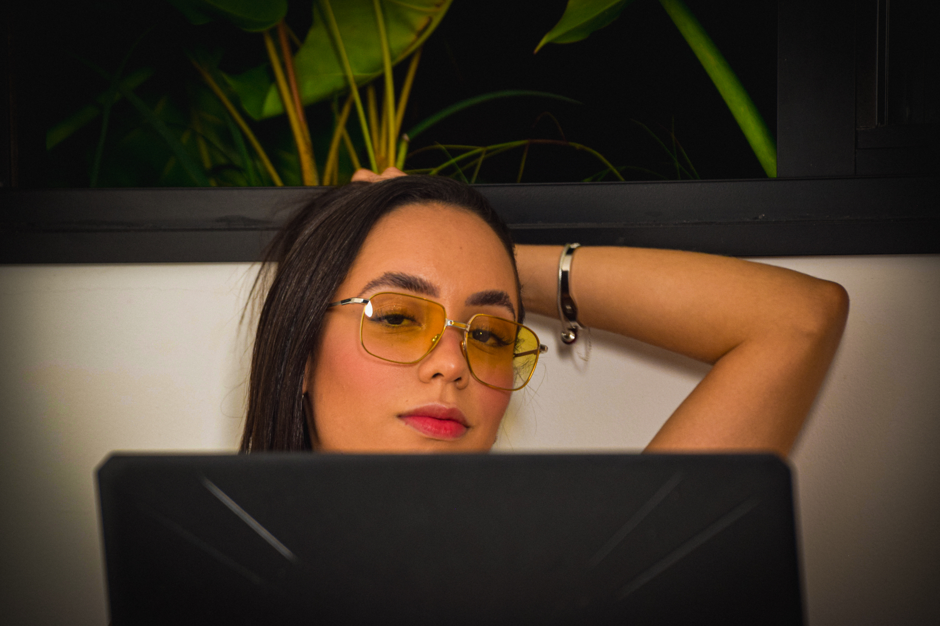 Portrait, yellow-tinted glasses