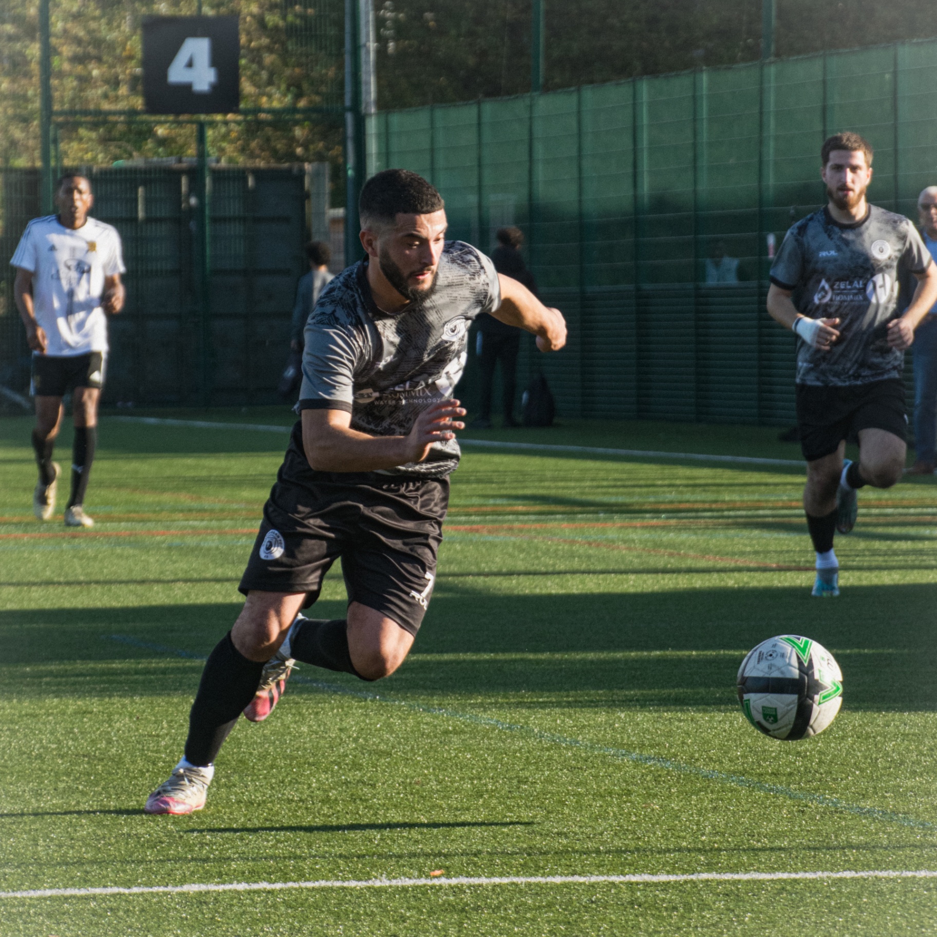 Player sprinting into space toward the ball